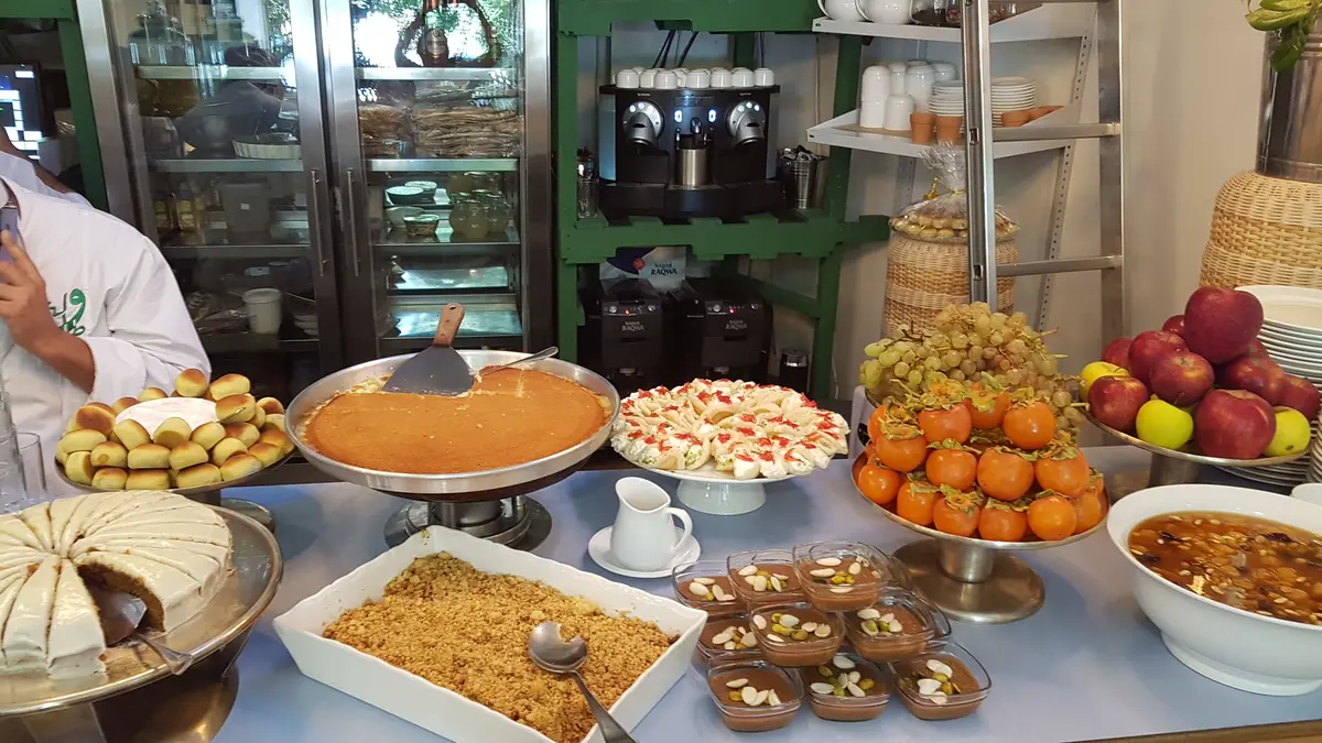 11 Best Lebanon Restaurants: A Food Critic's Guide 3 A colorful buffet spread of authentic Lebanese mezze and home-cooked dishes at Tawlet restaurant in Beirut.