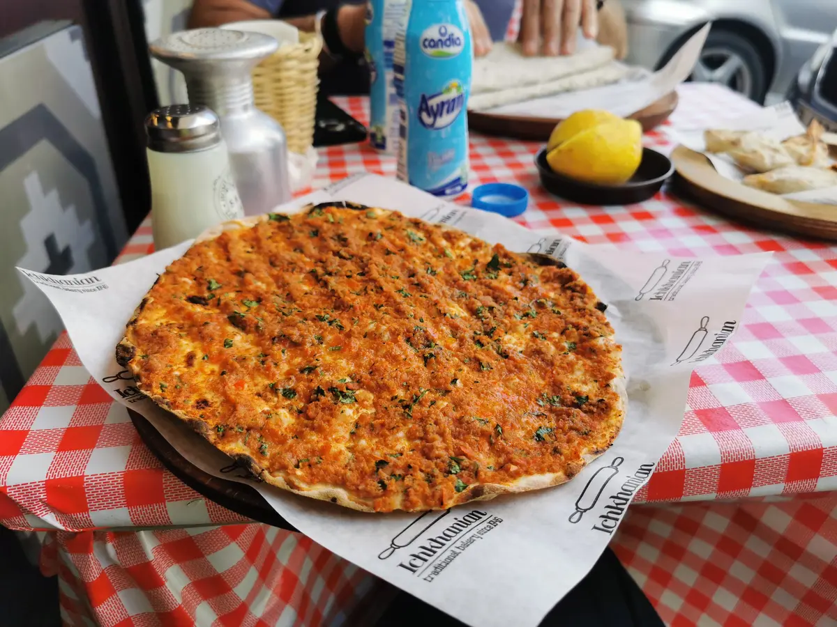 11 Best Lebanon Restaurants: A Food Critic's Guide 10 A round, thin lahme bi ajeen, or Armenian pizza, topped with minced meat and spices, from Ichkahanian Bakery.